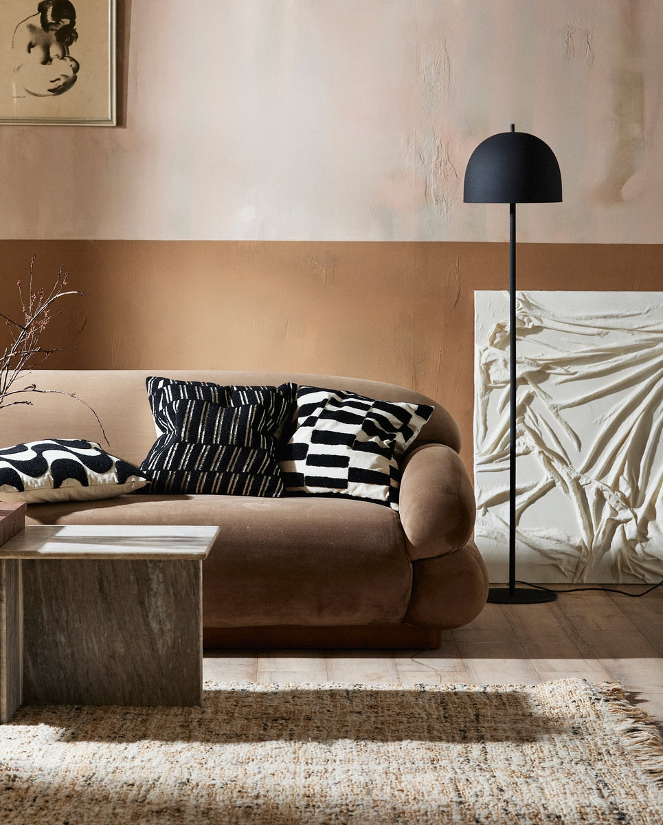 Sfeervolle woonkamer ingericht met Nordal interieur